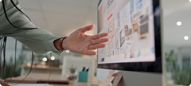 Designer presenting wireframes on monitor